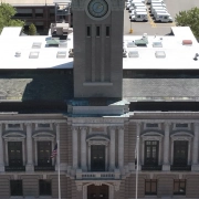 Greenwood Industries team completing historical restoration of Marlborough City Hall clock tower masonry and architectural metal.
