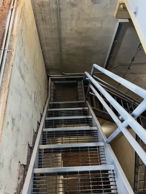 Greenwood Industries safety installation of new winding staircase inside Marlborough City Hall’s historic clocktower.