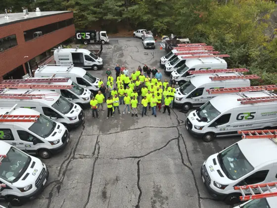milford-2-aerial-staff-in-lot-rows-of-branded-vehicles