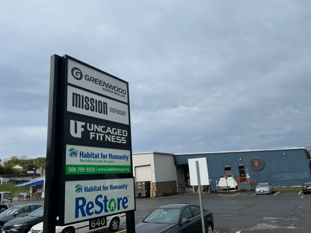 Monument sign including other businesses Greenwood