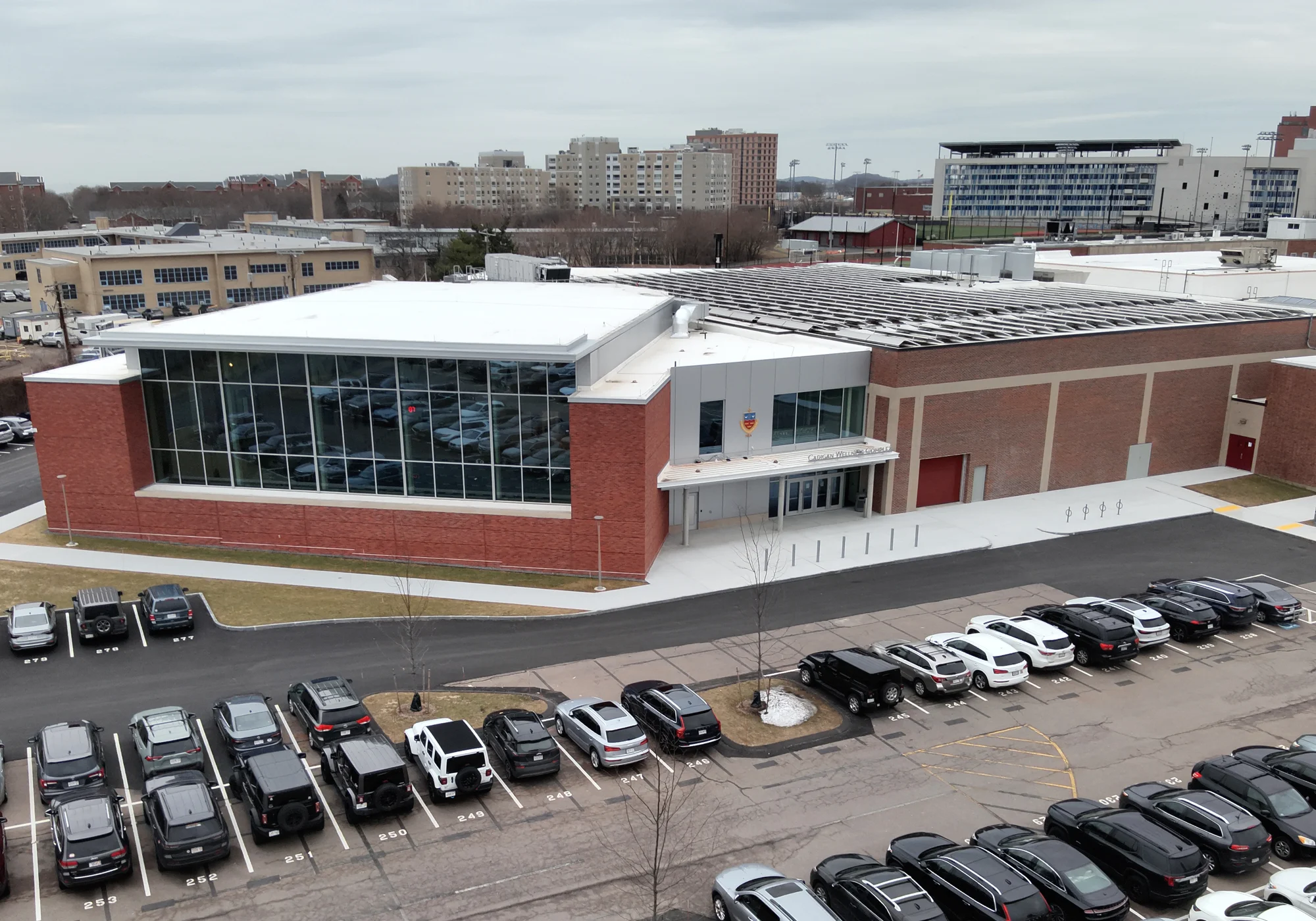 Drone photograph of the rear of Boston College High School’s Patrick Cadigan ’52 Family Foundation Wellness Center with a Greenwood Industries installed commercial roof.